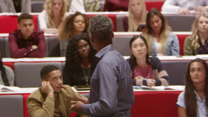 College students listening to professor
