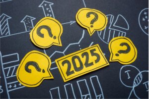 2025 on yellow paper with question marks surrounding it