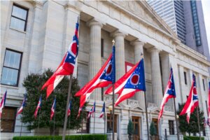 Ohio flags in front of building