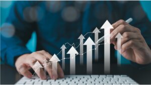 Keyboard with upward arrows and graphs